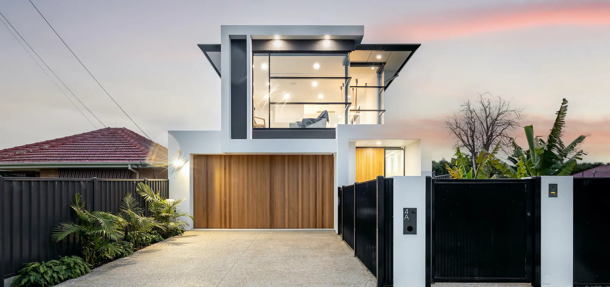 Residential two story house contruction showing front of house.